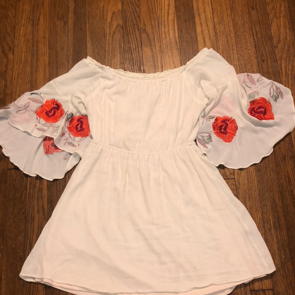 Cream dress with floral sleeves